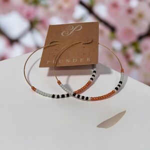 10/ $10  Plunder Gold Hoop Earrings with Orange, Black & White Beads
